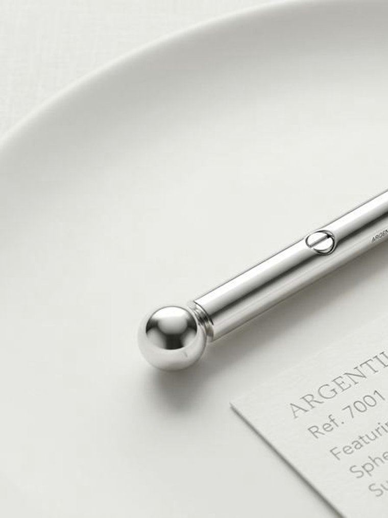 Argentium 960 silver bar and sphere pendant with specification card, the kind of consistency distributors require
