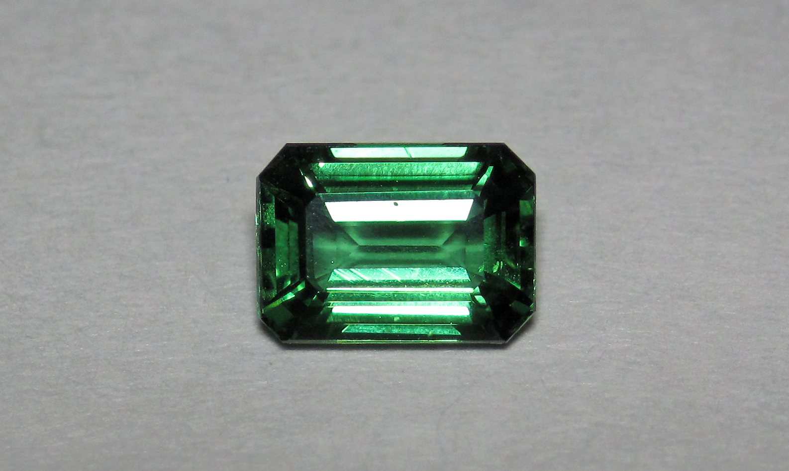 An emerald-cut green chrome tourmaline